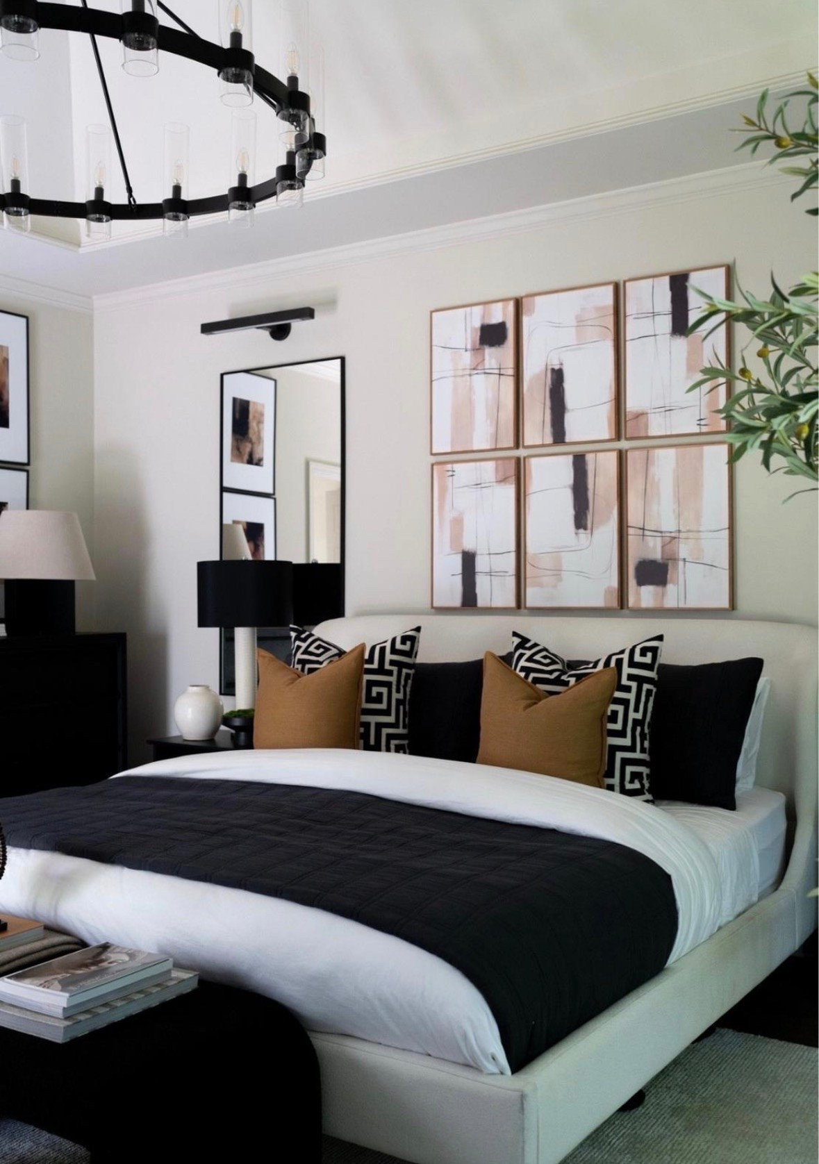 Heading into the weekend with the absolute coziest vibes!! I’m completely in love with this modern luxury bedroom… where bold black meets warm neutrals for the ultimate cozy chic vibe! From the striking geometric pillows to the sleek chandelier and abstract wall art, every detail screams sophisticated style. It’s the perfect blend of comfort and elegance to elevate your space! 

 #LTKStyleTip #HouseofValentina

#LTKgrwm #LTKSeasonal #LTKHome