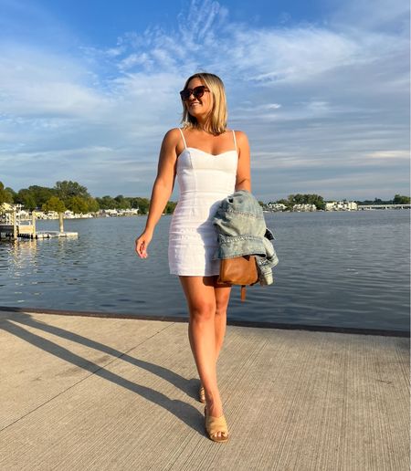 This dress is old but there are a few similar white linen mini dresses this year! 