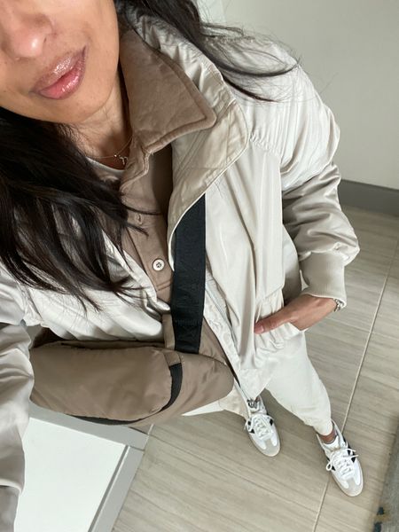 Travel outfit. Spring jacket. Athleisure. Bomber jacket is a really cute style. True to size. Has hood that rolls into collar and size zips. 
Joggers with slim fit. 
Belt bag. 
Sneakers  

#LTKfitness #LTKsalealert #LTKtravel