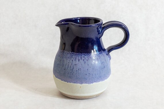 Small 16 oz serving pitcher. Two tone cascade in deep blue and snowy white. | Etsy (US)