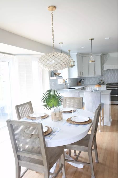 Love my little Coastal breakfast nook! Perfect if you're looking for Coastal dining room must haves! My Serena and Lily coastal chandelier is so gorgeous and I love these simple coastal table settings. (5/23)

#LTKstyletip #LTKhome