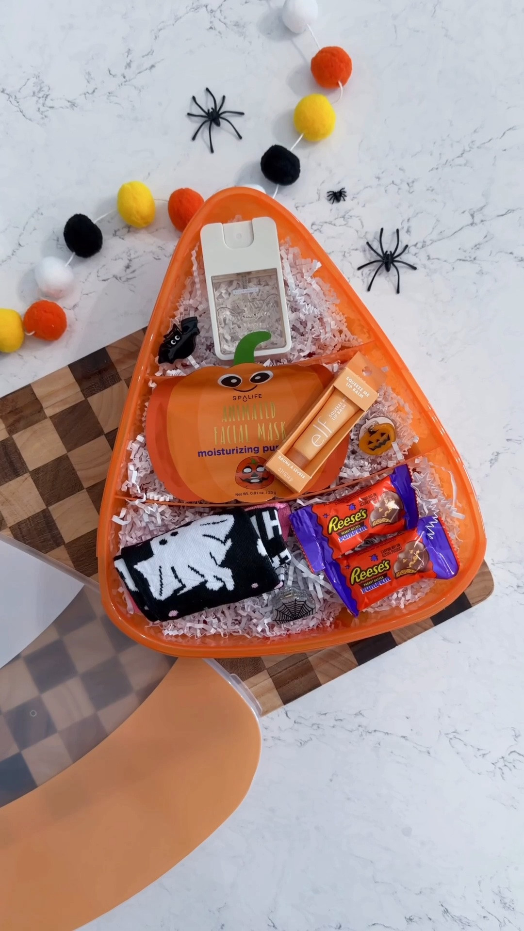 The cutest Halloween gift idea! 🍬🎃 This candy corn snackle box is such a fun way to package little self-care goodies, cozy favorites + candy for someone special.

I filled mine with hand sanitizer, a beauty mask, lip gloss, hair clips, socks and candy—but you could customize it with so many fun little finds!

Perfect for a friend, teacher, coworker, neighbor or anyone who deserves a little Halloween surprise. 🧡

COMMENT “shop” for the links.

+ SAVE this Halloween gift idea for later and send it to someone who needs to make one! 🎃

#HalloweenGiftIdeas #HalloweenDIY #SnackleBox #HalloweenGifts #GiftIdeas

#LTKmomlife #LTKSeasonal #LTKKids
