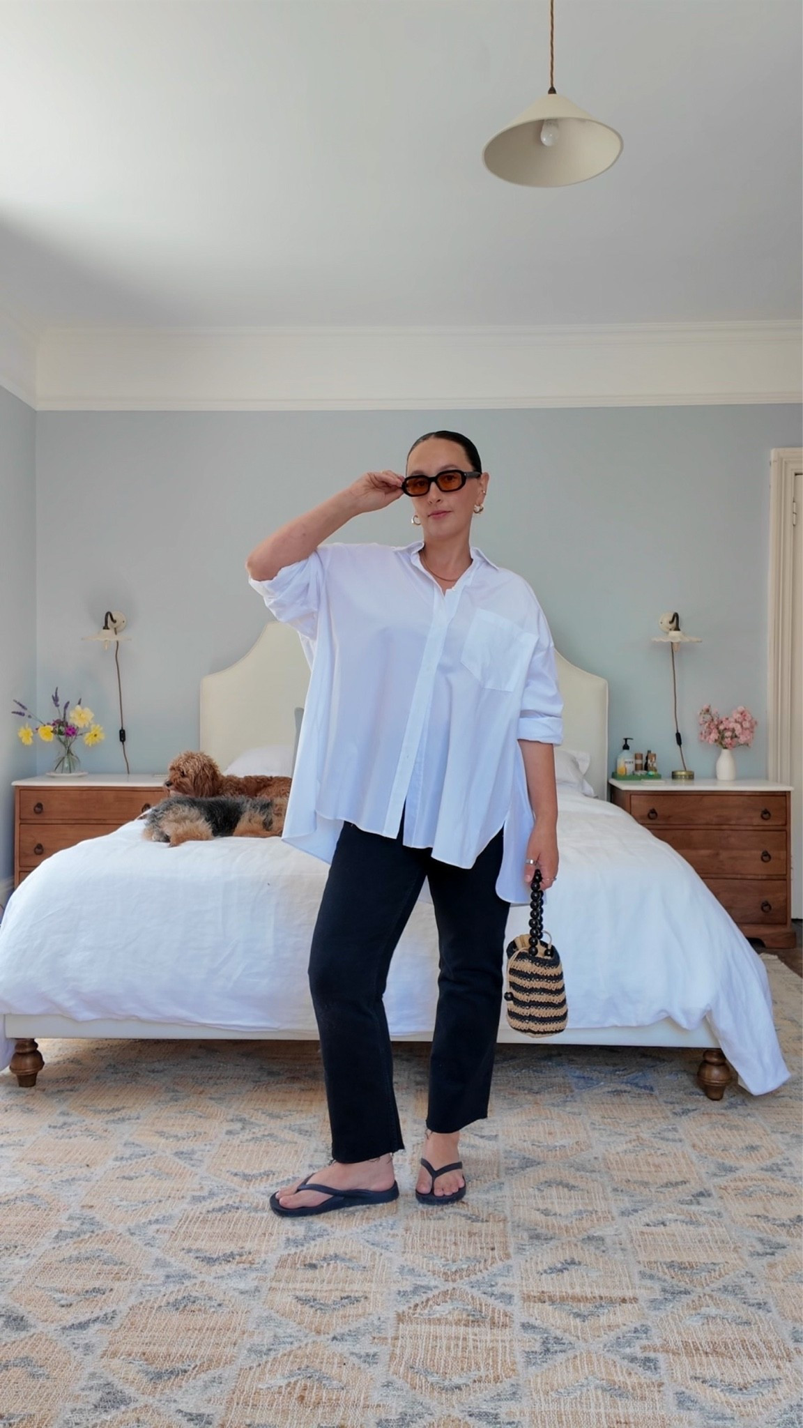 Oversized white shirt outfit 

My shirt is Frankie Shop and my black kick flare trousers are Zara. I can’t link them here, so have shared alternatives. My bag is old, so again, have shared alternatives. 

Midsize, summer outfit, over 40, size 14

#LTKuk #LTKsummer #LTKmidsize