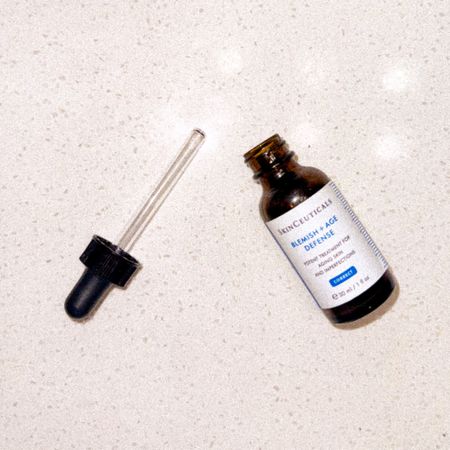 SkinCeuticals Blemish + Age Defense is a powerful treatment serum designed to target the visible signs of aging while also addressing blemishes and imperfections. Formulated with a potent blend of salicylic acid, glycolic acid, and citric acid, this lightweight serum helps to reduce the appearance of fine lines, wrinkles, and hyperpigmentation, while also unclogging pores and reducing blemishes.

This serum is ideal for those with aging skin who also struggle with frequent breakouts or acne. It is particularly effective for individuals with combination or oily skin types, as it helps to balance sebum production and improve overall skin texture. With regular use, SkinCeuticals Blemish + Age Defense can help to reveal a clearer, smoother, and more youthful complexion which is why I love it  

#LTKbeauty #LTKstyletip #LTKfindsunder100