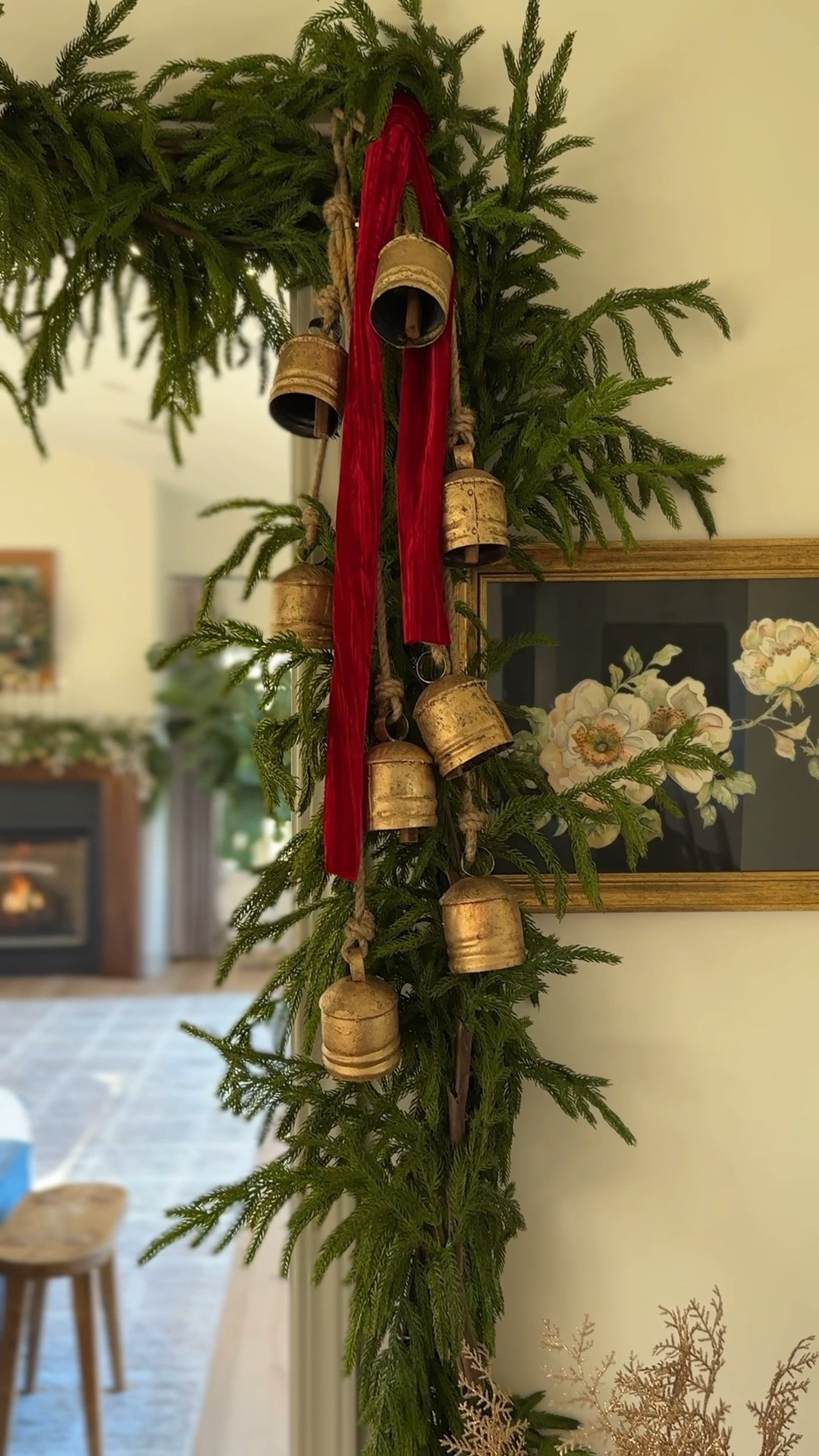 This 15 ft Norfolk pine garland will always be one of my top two faves. The cedar garland on the Christmas mantel is the second. Two incredible garlands that will last for years. I added some gold bells and ribbon to both to bring in a glow. Battery operated twinkle lights are the finishing touch! 

#LTKFindsUnder50 #LTKHoliday #LTKHome