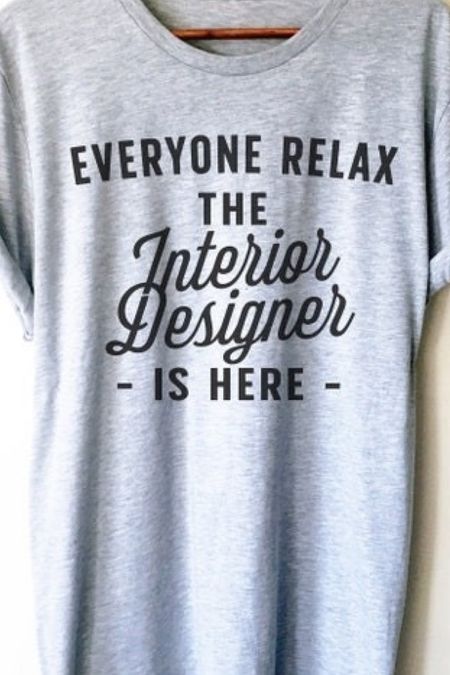 Interior designer gift guide. Get more gift ideas on my blog at julieannrachelle.com! (Look under gifts category! 🏡 If you're looking to add some style to your wardrobe, this Interior Designer Shirt/Tank Top/Hoodie is a must-have. With a special promo, when you buy any 4 shirts, you'll get the 5th one for free! Just use Coupon Code: STAGANDPEACH1 at Checkout.

Why should you consider this shirt? Well, it's been loved by over 46,000 happy customers since 2016, and it boasts more than 6000 positive reviews. It's safe to say it could become your new favorite shirt!

Our original design comes straight from the studio, and it looks and feels amazing. It's made from super-soft, ring-spun jersey cotton, giving it a lightweight, vintage feel that only gets better with age. The shirt is photographed in black ink on a heathered grey crew-neck, adding to its stylish appeal.

Some finer details: It's printed with eco-friendly inks, and it's both printed and shipped from the USA, ensuring quality. Plus, it's made to last, so you can enjoy it for a long time.

As for sizing, all our shirts, tanks, and hoodies are unisex, so you can find the perfect fit for you. Don't forget to scroll through the images to check out sizing charts and color/style options.

Here's a quick rundown of the product details:

**Unisex Shirts:**
- Made from 100% combed and ring-spun cotton (heathered colors contain polyester).
- Features shoulder-to-shoulder taping and is side-seamed.
- For a looser fit, consider ordering one size up.

**Unisex Tank Tops:**
- Crafted from 100% fine jersey cotton (heathered grey and red contains polyester).
- Double hemmed with banded arm and head holes.
- Women might want to order one size down for a tighter fit.

**Unisex Hoodies:**
- Made from a soft Air-Jet Spun Cotton Blend (50% polyester/50% cotton).
- Double Lined Hood and Double-Needle Stitching Throughout.
- Equipped with a front pouch pocket and true to size.

So, if you want to express your love for interior design and look stylish doing it, don't miss out on this fantastic shirt! 😊🏠

#LTKworkwear #LTKfindsunder50 #LTKGiftGuide