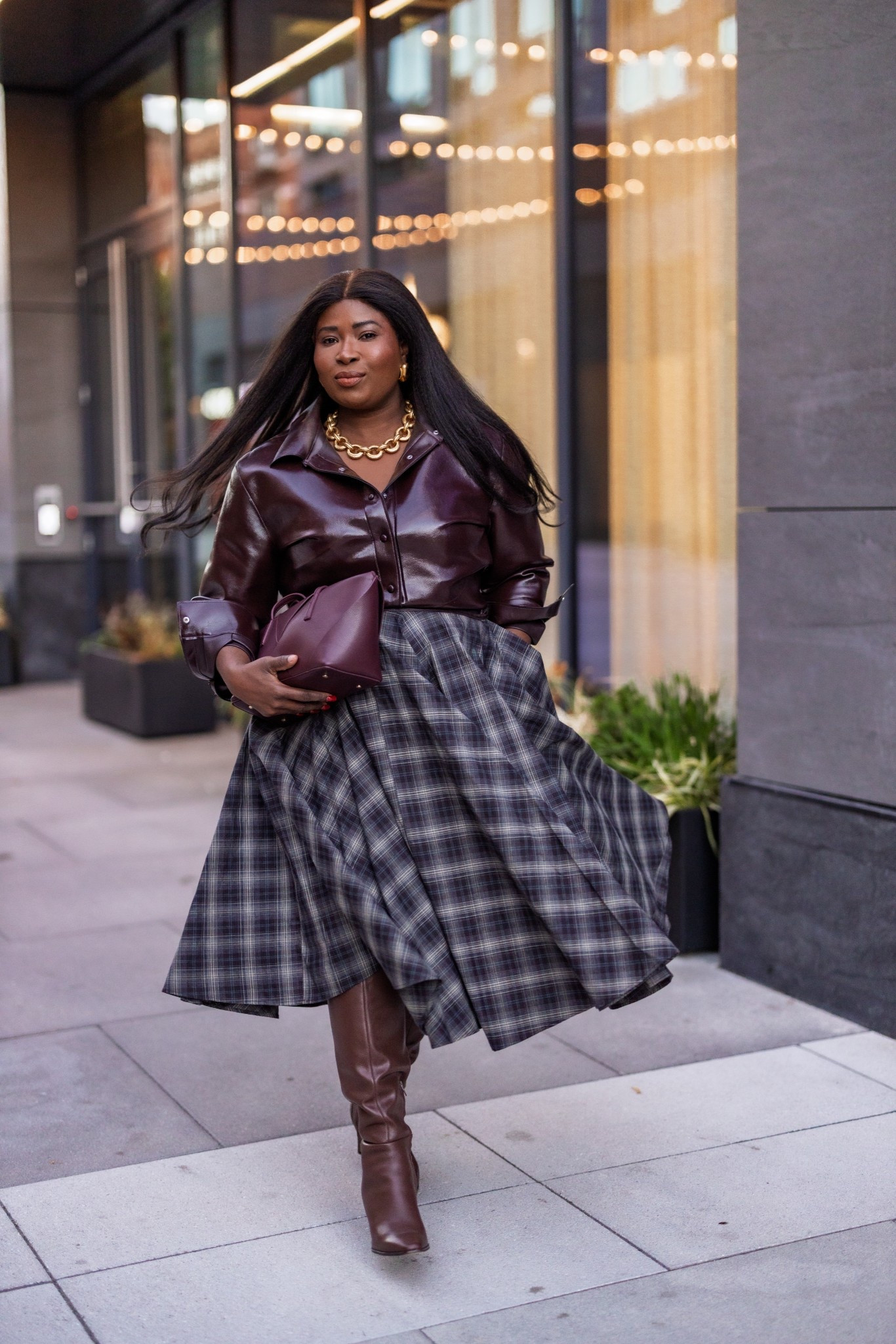 Styling plaid midi skirt and leather knee high boots for fall 

#LTKStyleTip #LTKPlusSize #LTKOver40