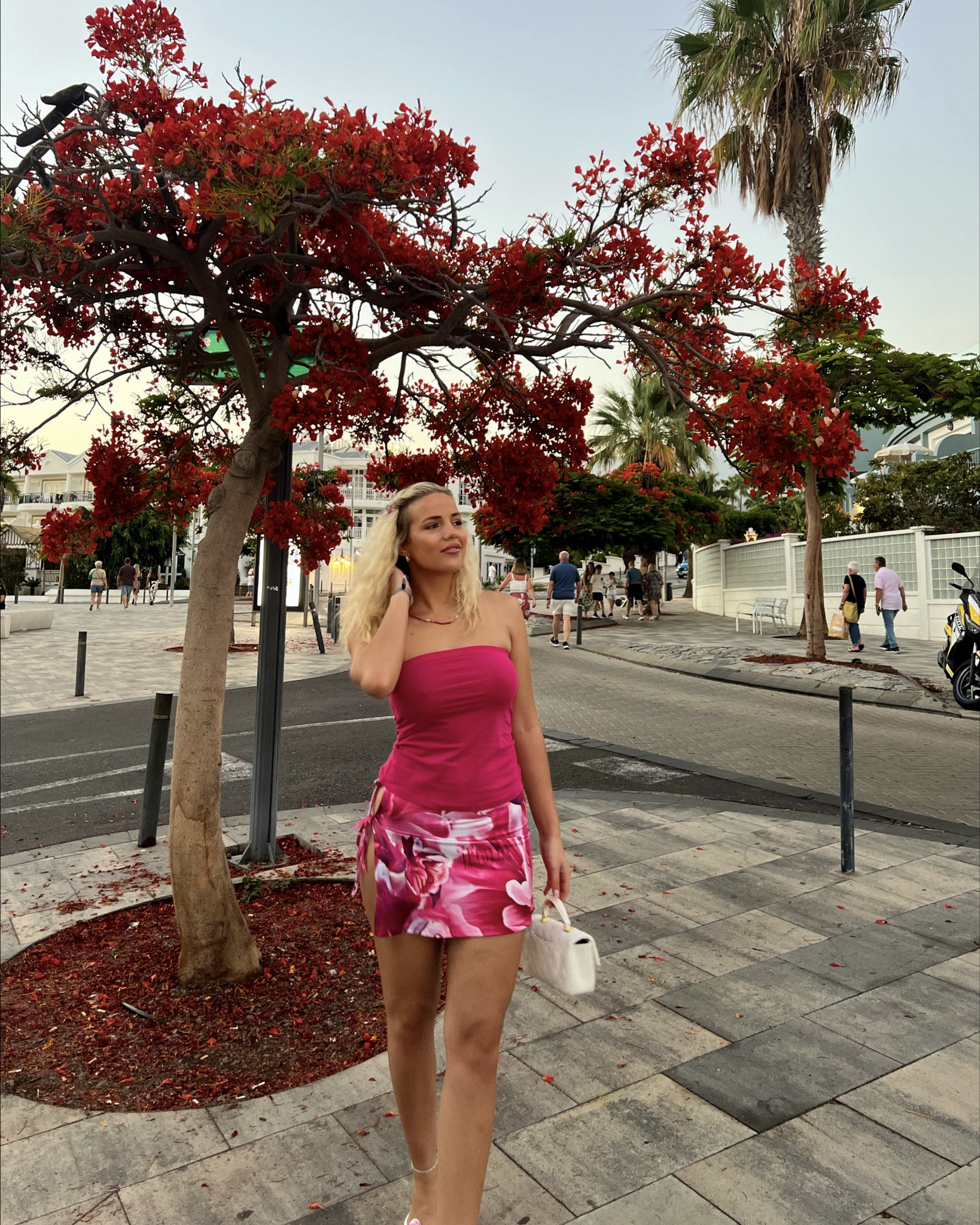 Pink holiday outfit, Tenerife outfit, barbie, hot pink bandeau, hot pink mini skirt, white bag, white mini bag, white flip flop heels, floral skirt🌺✨

#LTKuk #LTKsummer #LTKSummerSale