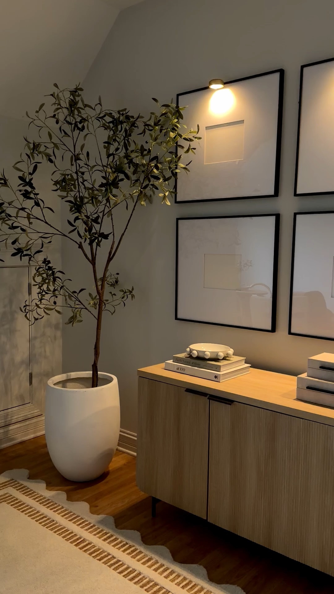 Added picture lights above the frames and it completely elevated this console moment ✨ Sharing the lights plus the decor styled here.

#LTKHome