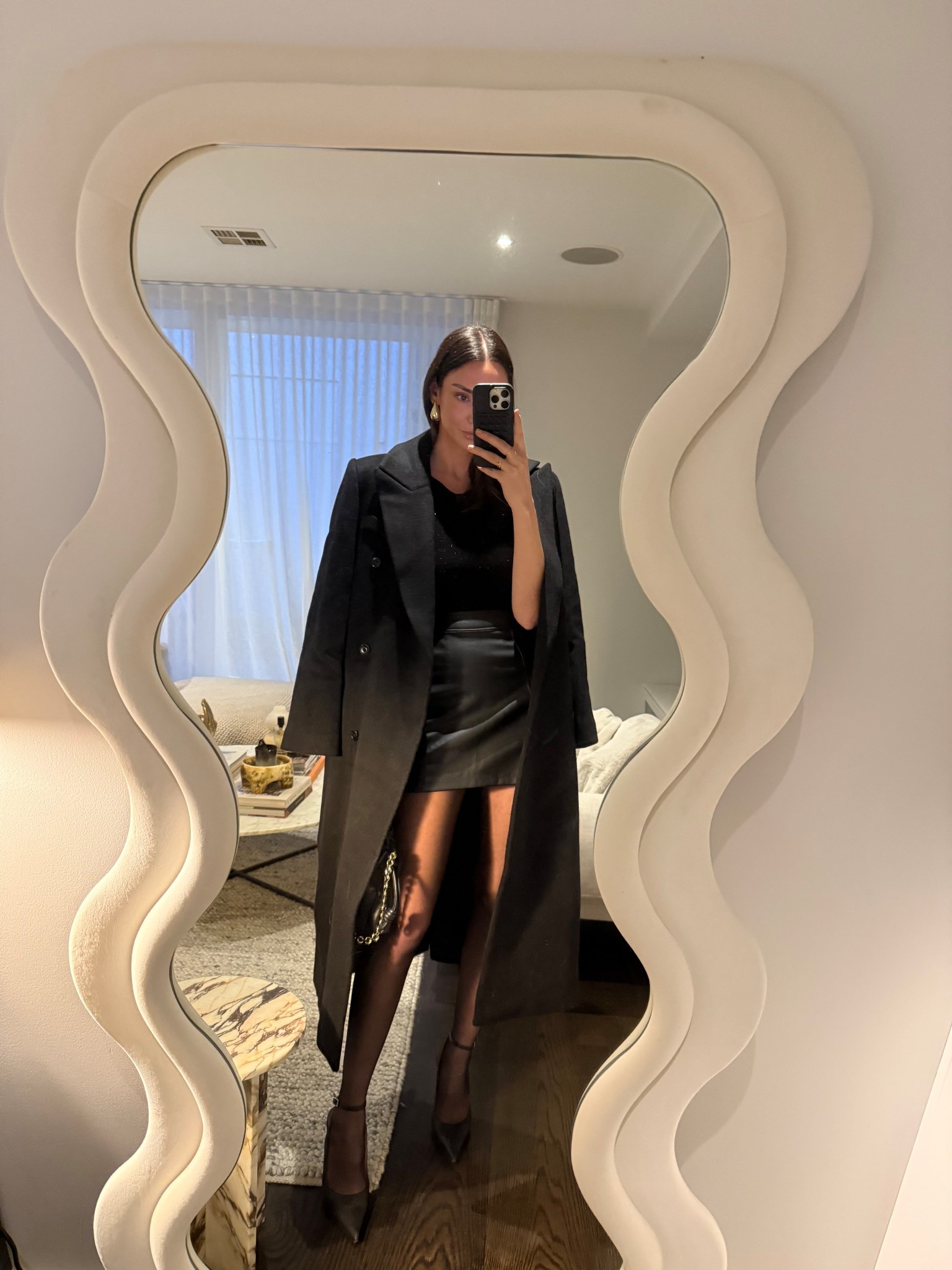 Ready for winter dressing in New season Aje 
Black tailored wool coat 
Black leather mini skirt 
Sheer tights 
Black heels 

#LTKautumn #LTKstyletip #LTKaustralia