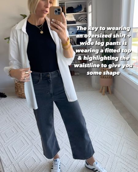 Styling a classic oversized, white button up shirt as cardigan, layering over a fitted tank. 

I’m wearing a size small in this cotton shite shirt 

Wearing a size 38 (6) in these wide leg jeans 

#LTKVideo #LTKfindsunder50 #LTKover40