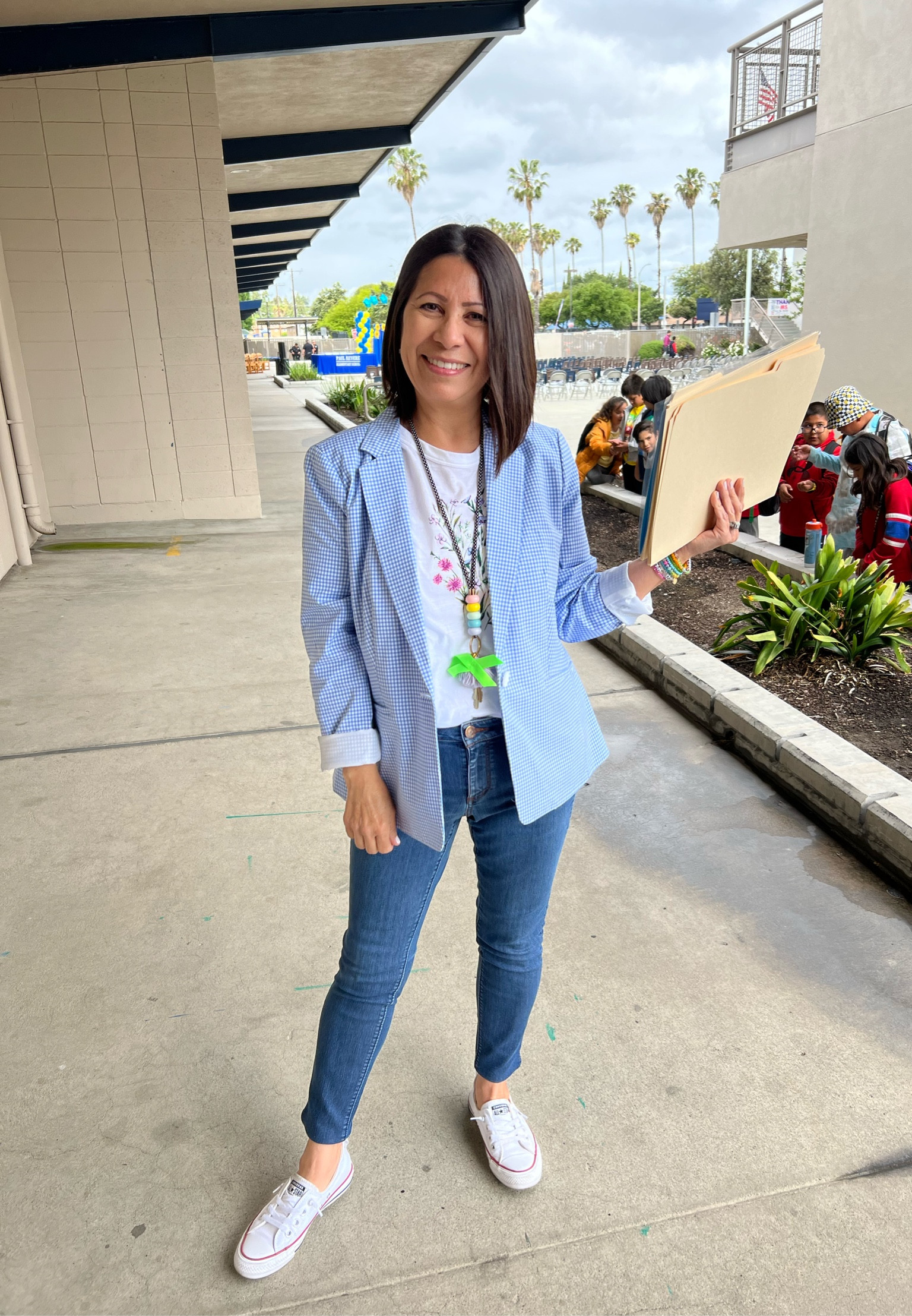 Blazer outfit idea

petite sizes | floral graphic tee | petite jeans | light blue | beaded bracelets | teacher outfits | teacher style

#LTKfind

#LTKworkwear #LTKshoecrush #LTKstyletip