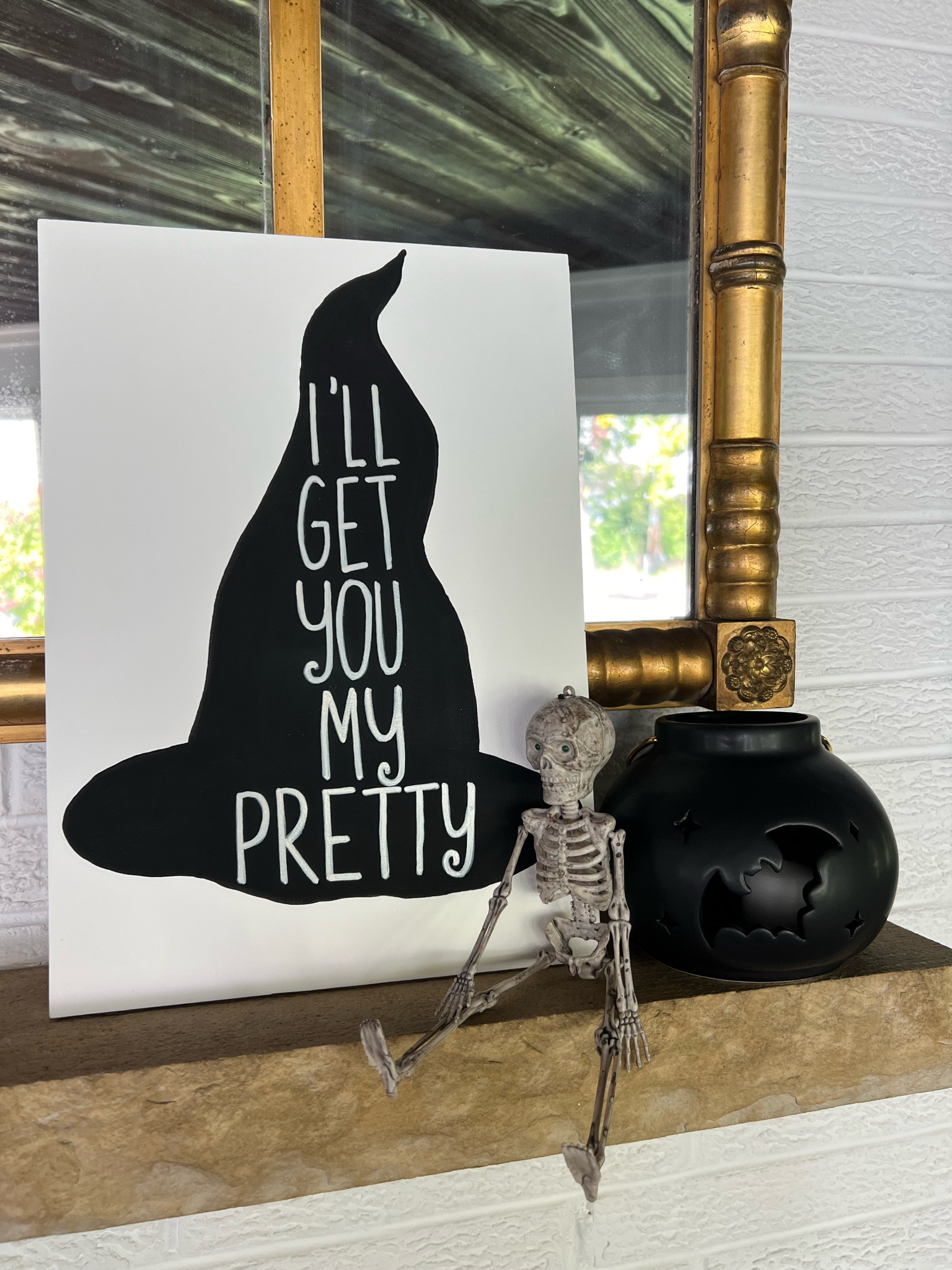 Halloween home decor 
Linked this and a bunch of what I use - some is similar because it is from years in the past.
Sign is DIY - super easy, I’ll link the paint I used. 

Halloween, Halloween decor, fireplace mantel decor

#LTKHalloween #LTKhome #LTKfindsunder50