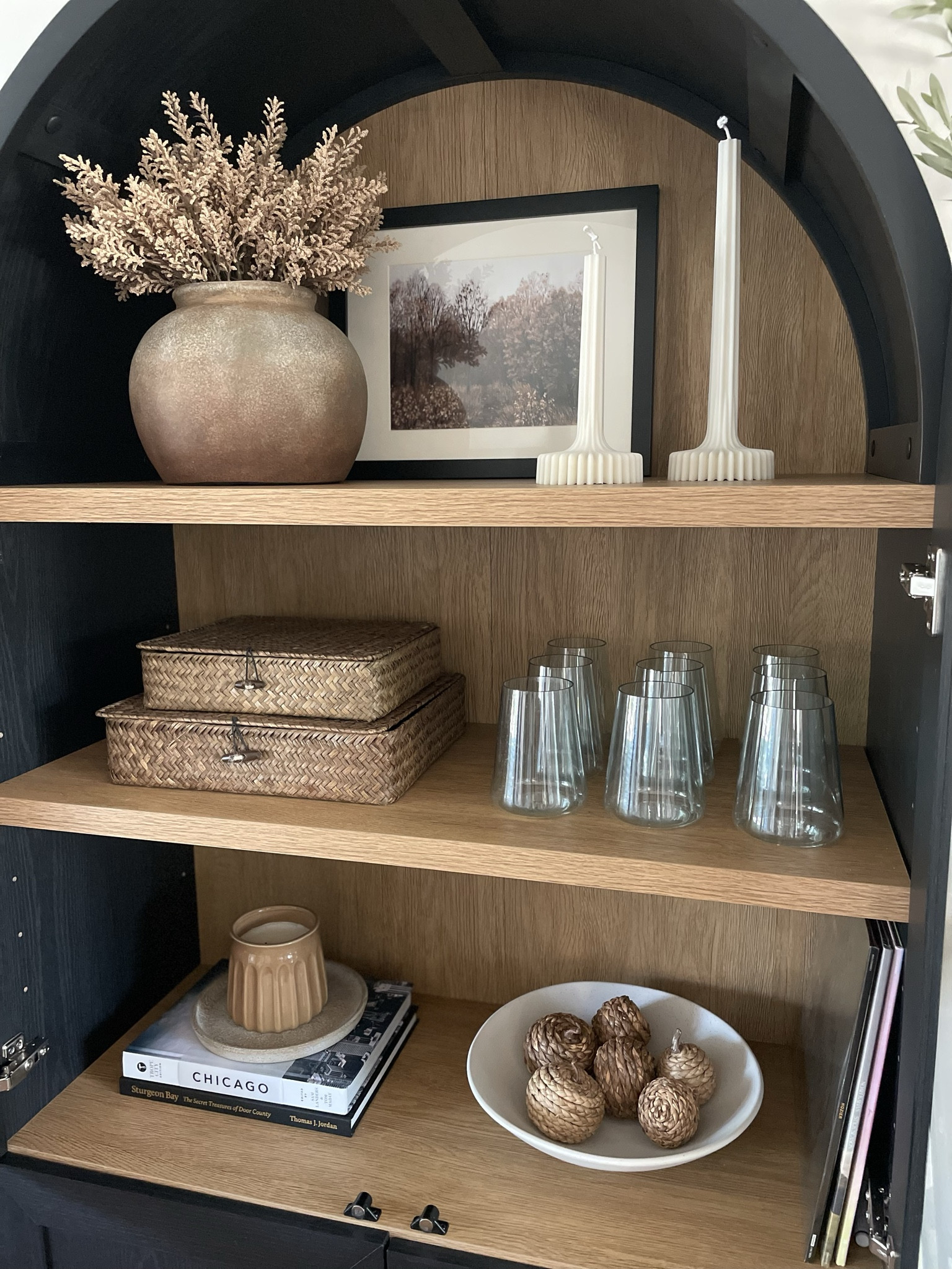 My fall arched cabinet styling. Honestly, I didn’t change much here. I love how it’s styled and the pieces in here so I keep most of them year round!

#LTKHome #LTKStyleTip #LTKSeasonal
