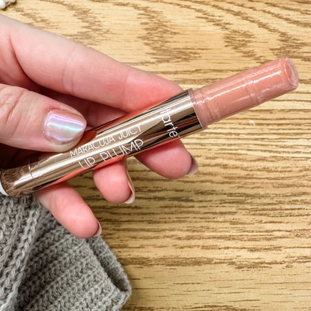 My favorite purse lip gloss. It’s plumping, the perfect nude and affordable  

#LTKMostLoved #LTKbeauty #LTKfindsunder50