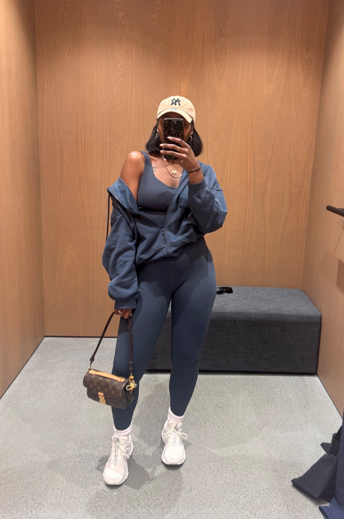 Wearing a large in the jacket and leggings and a medium in the tank