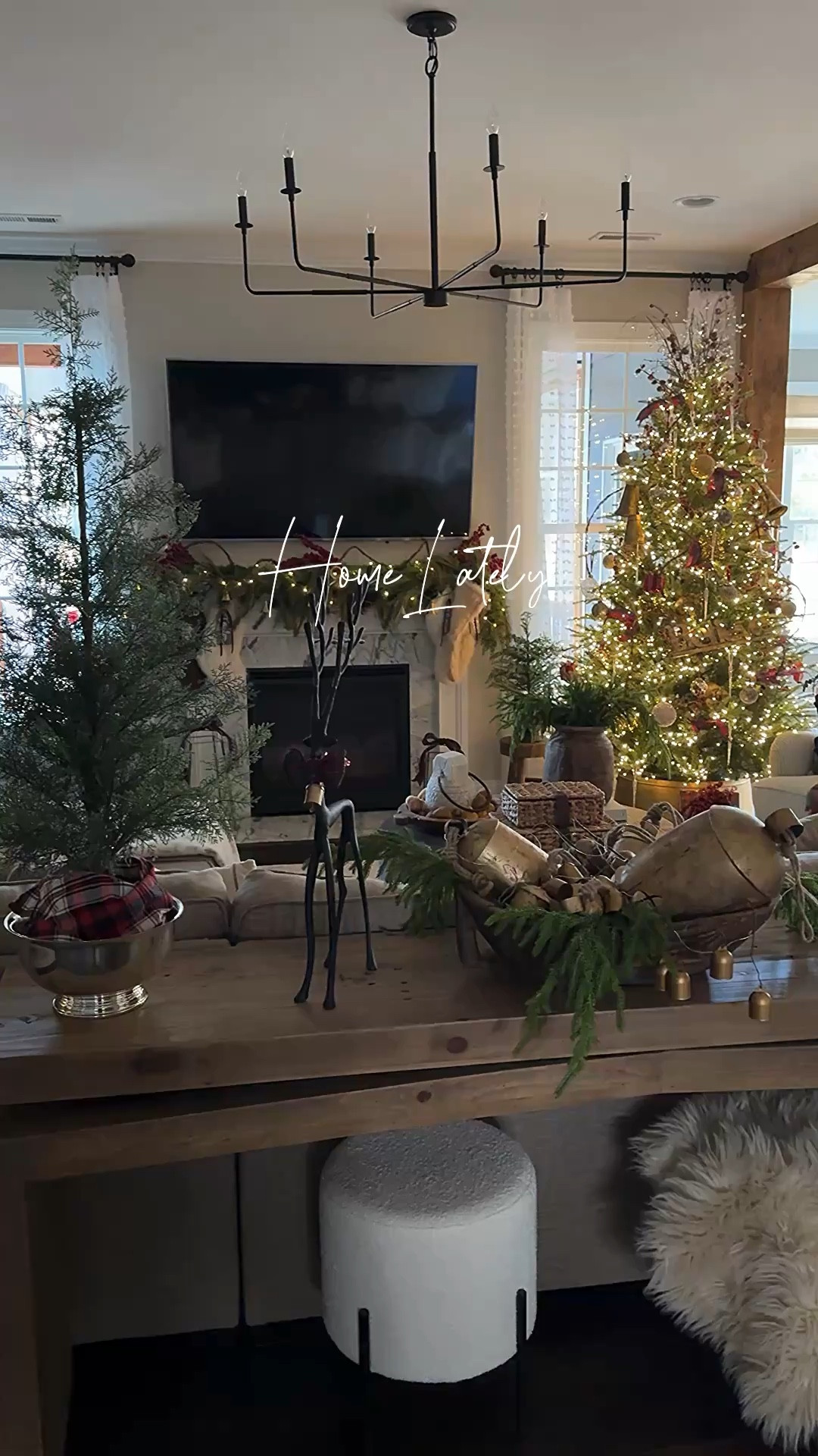 My Christmas Home Lately!!
I have a 15% discount code for my Santa canvas print: FARMHOUSECHIC15
The print is called Holly Jolly Spirit and the size is 22” x 46”.

Grand Duchess Christmas tree, Santa canvas print, Christmas tree pillow covers, reindeer, garland, gold bells, vintage inspired ornaments, grapevine garland, gold tree collars, berry stems, woven vase, chandelier, velvet ribbon, floor lamp with woven shade, bell garland, faux fur stockings, large gold shatterproof ornaments, Norfolk pine stems, plaid throw, stocking name tags, mini Christmas tree, woven storage boxes, upholstered side chair