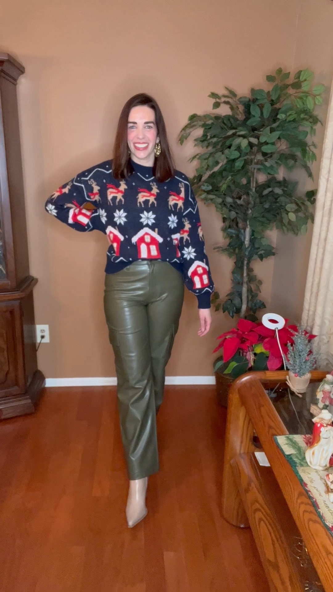 Navy blue reindeer sweater (xs). Green leather cargo pants (27). Beige ankle boots (8.5). #sweater #reindeersweater #navybluesweater #pants #cargopants #leatherpants #greenpants #boots #ankleboots #beigeboots #christmasoutfit #holidayoutfit 
holiday outfits women
christmas outfit women 

#LTKSeasonal #LTKFindsUnder100 #LTKHoliday