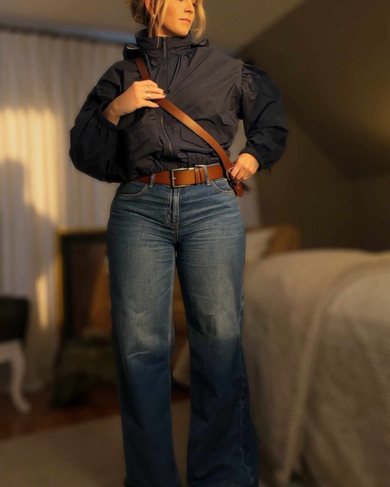 New arrival from American Eagle 🤍 This navy blue windbreaker is the perfect lightweight spring layer. The drop pleated sleeves add an elevated, on-trend detail that makes it feel anything but basic.
@American Eagle Outfitters 

I’m 5”8’ and a size 12 wearing an XL in the jacket. 
Wide-leg Jeans: 10 Long for a less baggy look. 

#LTKSeasonal #LTKootd #LTKTall