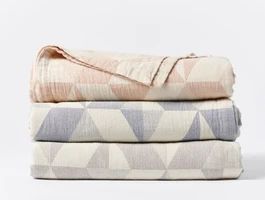 With its dynamic geometry, our Pismo Blanket is a contemporary take on matelassé. Woven of organ... | Coyuchi Inc.