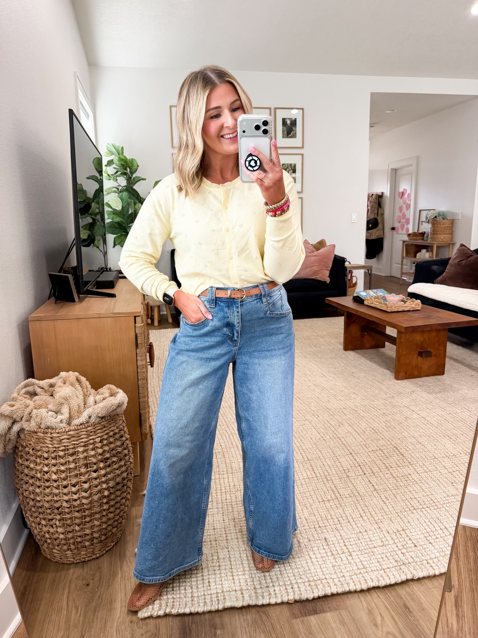 Ultra wide leg jeans are having a moment and this pair is GOOD 👏 The relaxed fit is so comfortable but still looks elevated and put together. Paired it with a lightweight cardigan (a huge spring trend) that’s perfect worn buttoned up like a top or layered over tanks and tees.

This is the kind of outfit that works for everyday life — comfortable, flattering, and easy to recreate with pieces you’ll wear all spring.

Linked my exact jeans, cardigan, and shoes here 🤍

Size 4short in the jeans - if in between sizes, go down! 
Medium cardigan but wish I did a small 

#LTKSaleAlert #LTKPetite #LTKootd