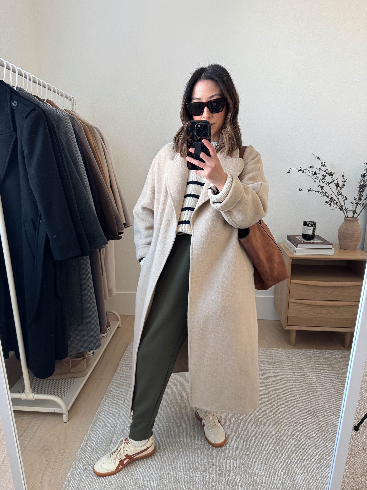 Winter can get a bit depressing when it comes to getting dressed. That's why I put together a winter outfit formula. It saves mental energy, it guarantees polish, it prevents overbuying, and builds consistency. 

Winter outfit formula: 

1. Coat
2. Sweater/Sweatshirt
3. Jeans/Sweats/Lounge/Pants
4. Color Coordinate shoes and bags

Outfit Details
Gentle Herd Coat xs (old)
Z Supply sweater xs (old)
Varley slim pants xs 26" inseam
Onitsuka Tiger 4 mens
Celine sunglasses
Sezane tote

#LTKSeasonal #LTKPetite