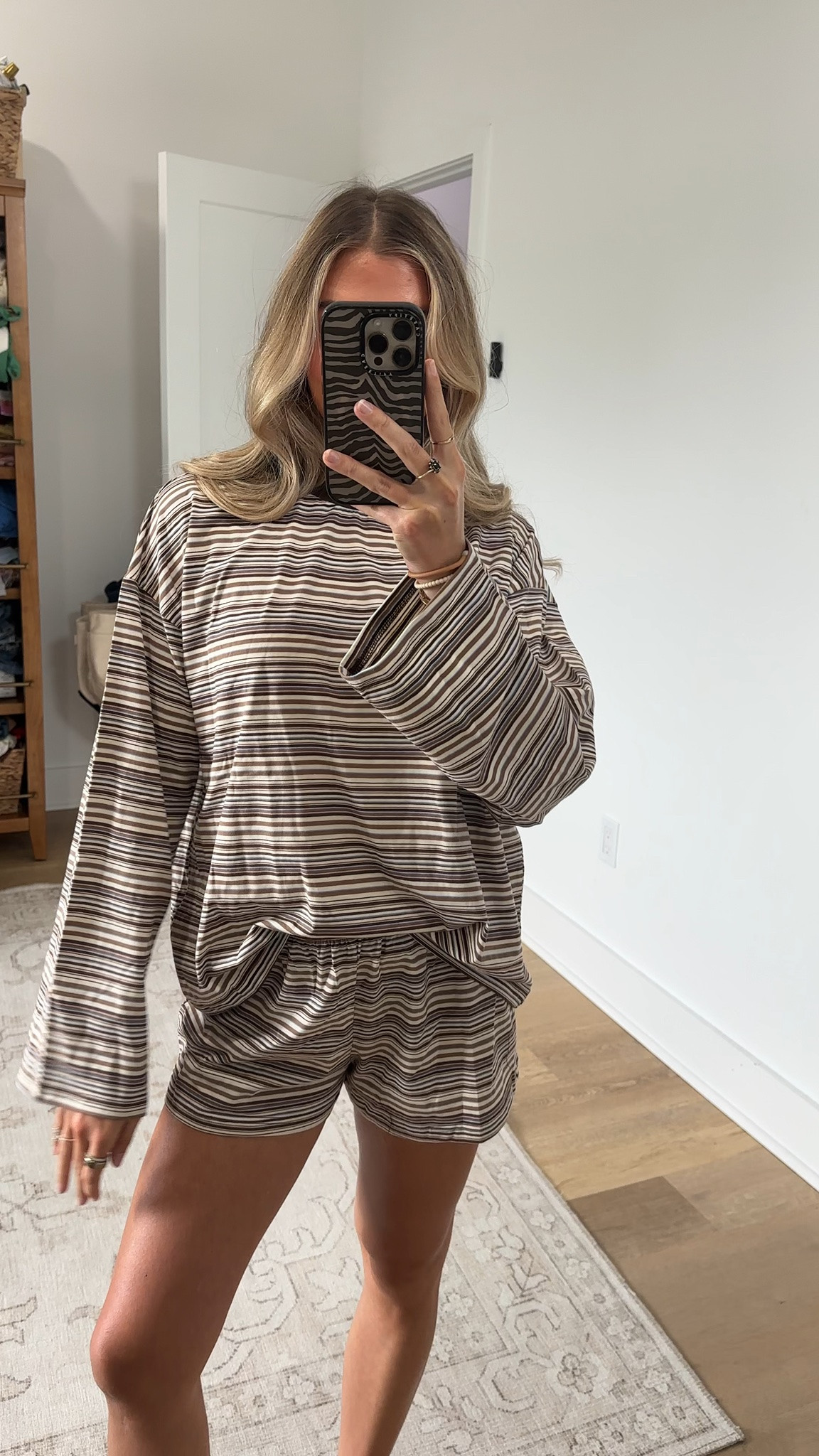 @Petal & Pup size xs The Silvia Knit Short Set in Chocolate Brown Stripe is your new go-to for those days when you want to look put-together without overthinking it. The matching top features a round neckline and long sleeves, with a relaxed fit that moves with you from morning coffee runs to lazy afternoons.

#LTKootd #LTKSeasonal #LTKdayinmylife