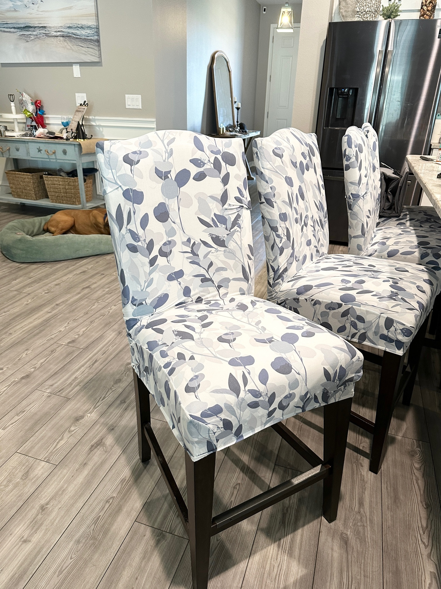 Love these stretchy chair covers. They feel comfortable and soft, and brighten up the room! Easy to wash and take on or off my barstools. 

#LTKhome