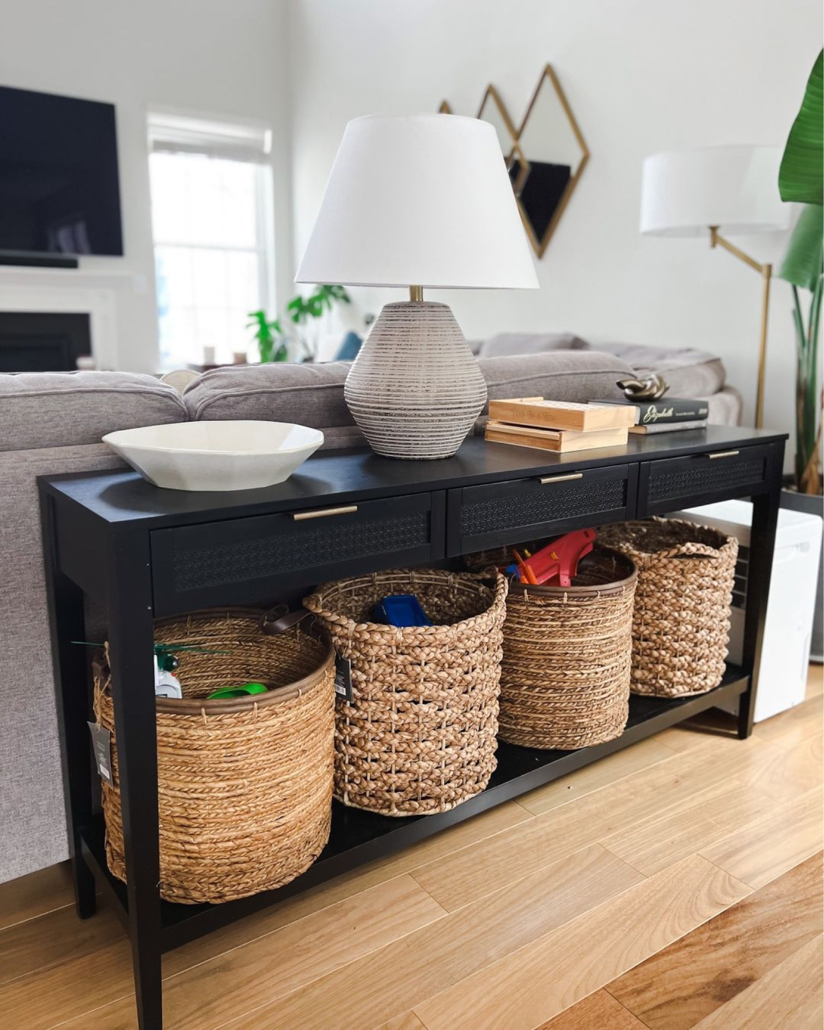 Oh how I would love to keep all of the boys toys in the basement,  BUT they just don't seem to want that to happen.  So I created this space behind the couch to store the random stuff that makes it's way up.


Beach vacation
Wedding Guest
Spring fashion
Spring dresses
Vacation Outfits
Rug
Home Decor
Sneakers
Jeans
Bedroom
Maternity Outfit
Resort Wear
Nursery
Summer fashion
Summer swimsuits
Women’s swimwear
Body conscious swimwear
Affordable swimwear
Summer swimsuits
Summer fashion
2023 swim

#LTKhome #LTKstyletip #LTKSeasonal