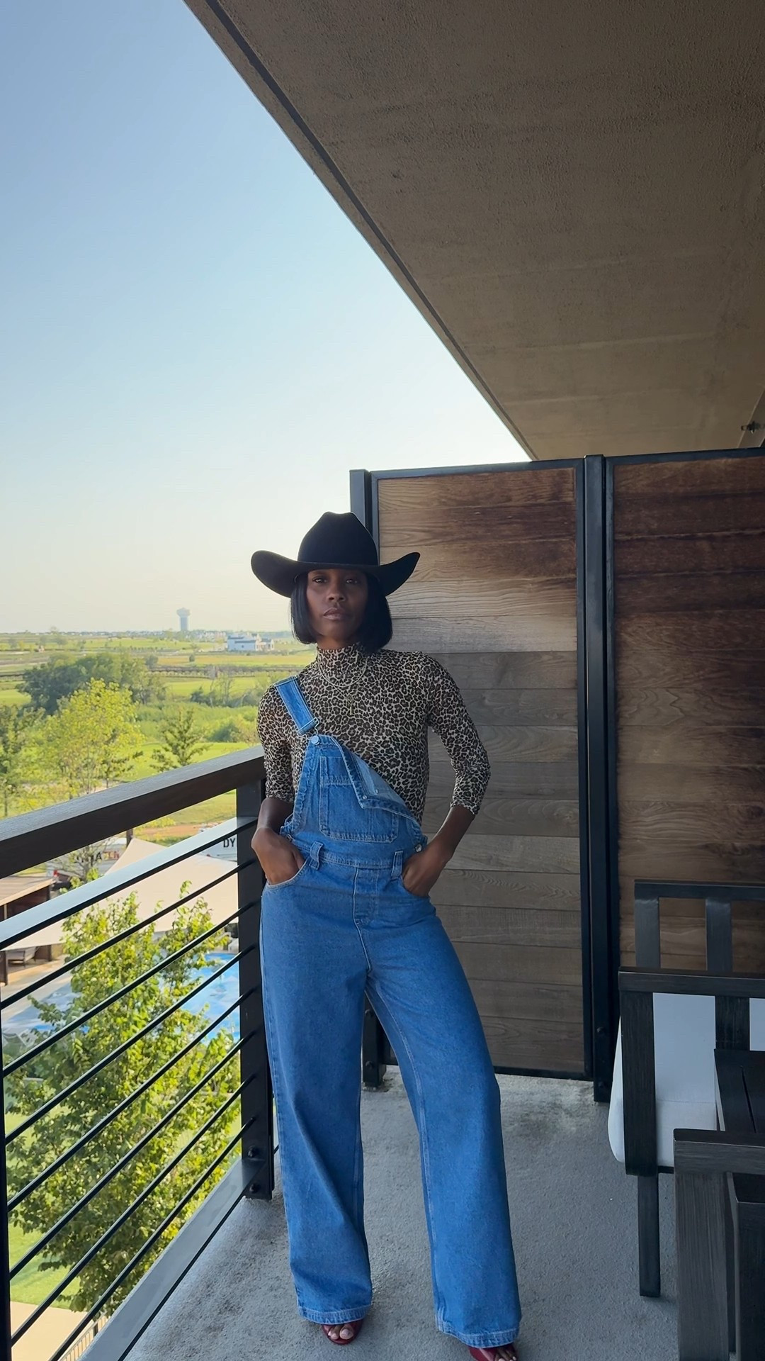 Leopard print top, denim overalls, cowboy hat, red heels - LTKcon 

#LTKCon #LTKStyleTip