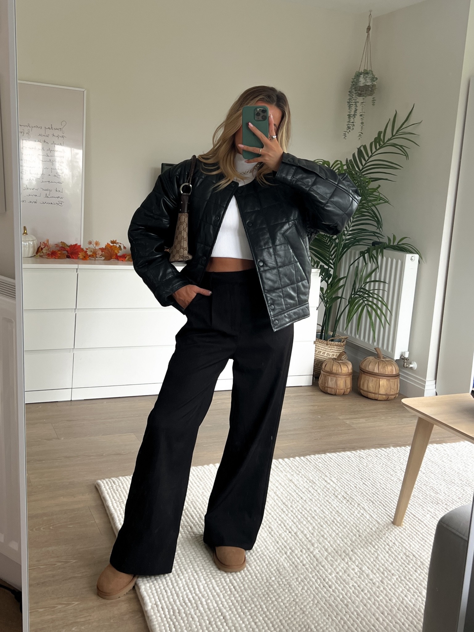 H&M leather quilted bomber jacket has never fit an outfit so perfectly! Styled with  wide leg black tailored trousers and ultra low uggs - with white ribbed high neck vest underneath. It’s a very smart, casual outfit that would work for minimal officewear or everyday style. 

#LTKeurope #LTKunder100 #LTKstyletip