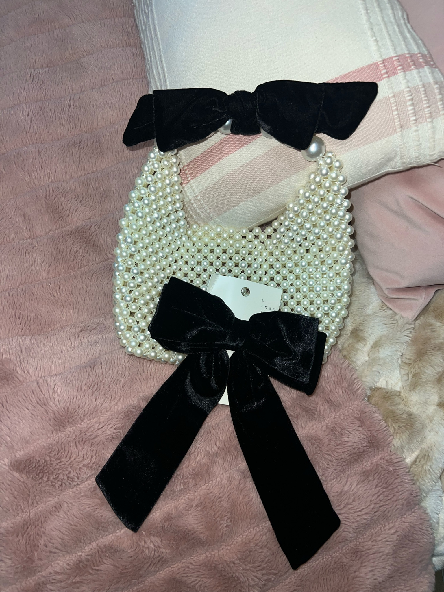 I’m a sucker for bows and pearls 😍
Bag is sold out!! If you can find it in store you’re lucky!! 

#LTKStyleTip #LTKSeasonal #LTKItBag