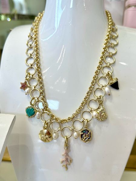 Obsessed with this coastal charm necklace! Your can remove the charms and wear them individually on the spare chain too!!! The new Kendra Scott Summer collection is all the beachy coastal vibes I’m loving right now!!! 

Seashell, Pearl, coastal jewelry, seashell earrings, seashell ring 

#LTKGiftGuide #LTKWorkwear #LTKSeasonal