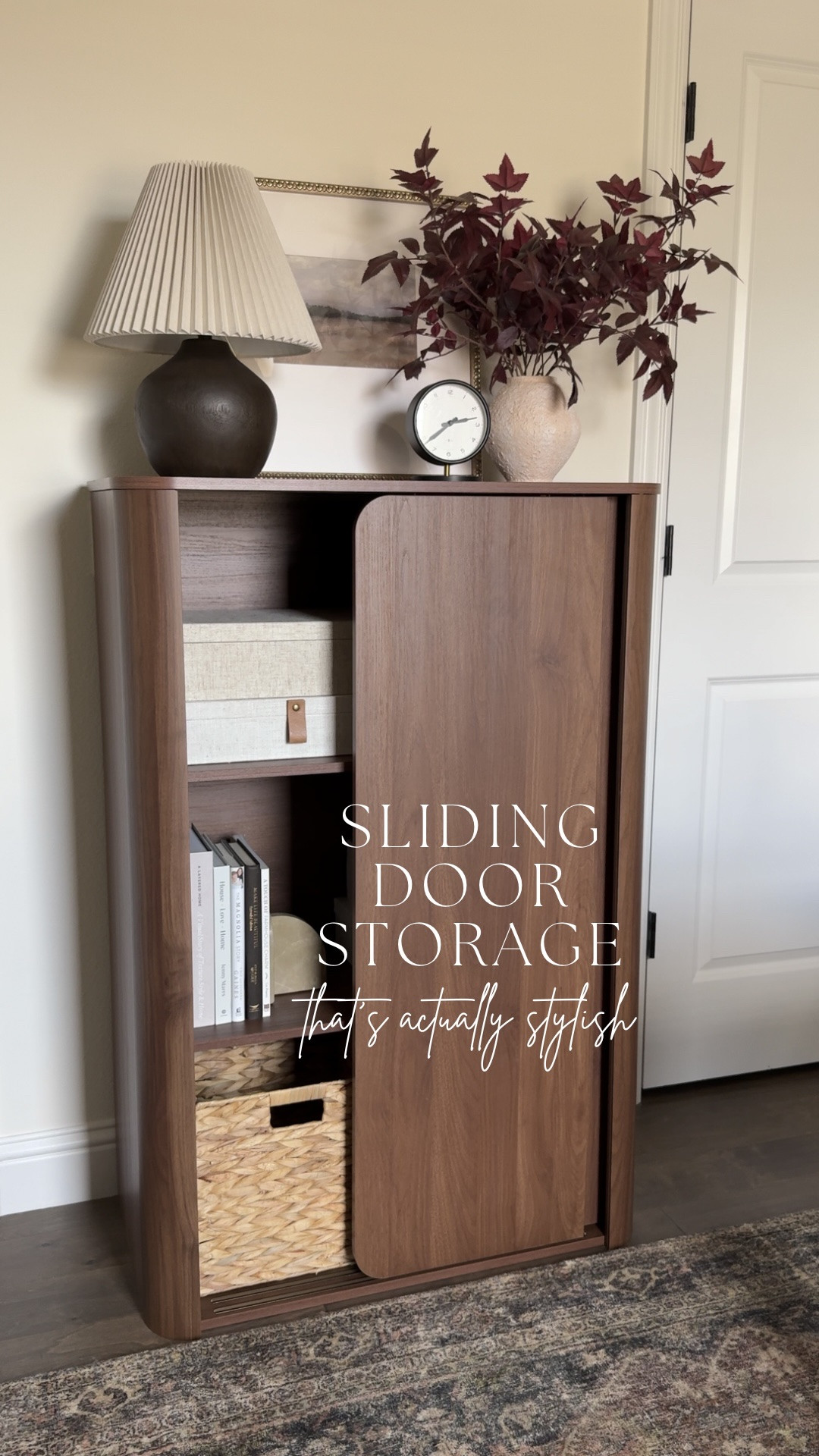 This sliding door cabinet is the perfect mix of storage and style! I love the warm wood finish, rounded details, and the option to display a few favorites while keeping everything else tucked away. Such a versatile piece for any room!

#LTKHome