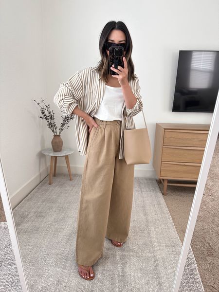 Madewell Harlow trousers multiple ways. 

Reformation shirt xs (old)
Reformation tank xs
Madewell Harlow pants 00
J.crew sandals 5
The row tote small
Celine sunglasses  

