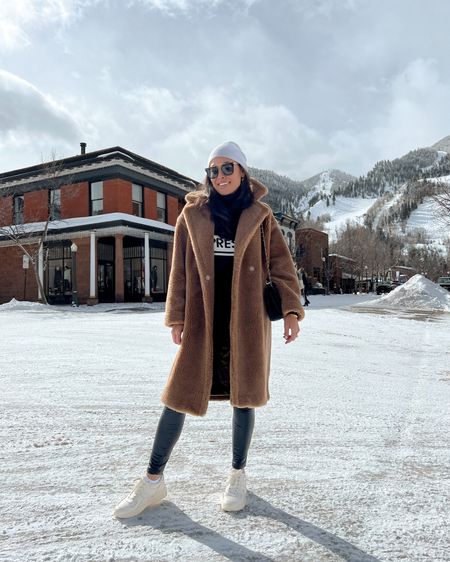 Kat Jamieson wears a teddy Sherpa coat, ski turtleneck, cashmere beanie, leather leggings, Chanel bag, and white sneakers in Aspen. Winter style, winter outfit, cozy layers, travel. 

#LTKSeasonal #LTKshoecrush #LTKtravel