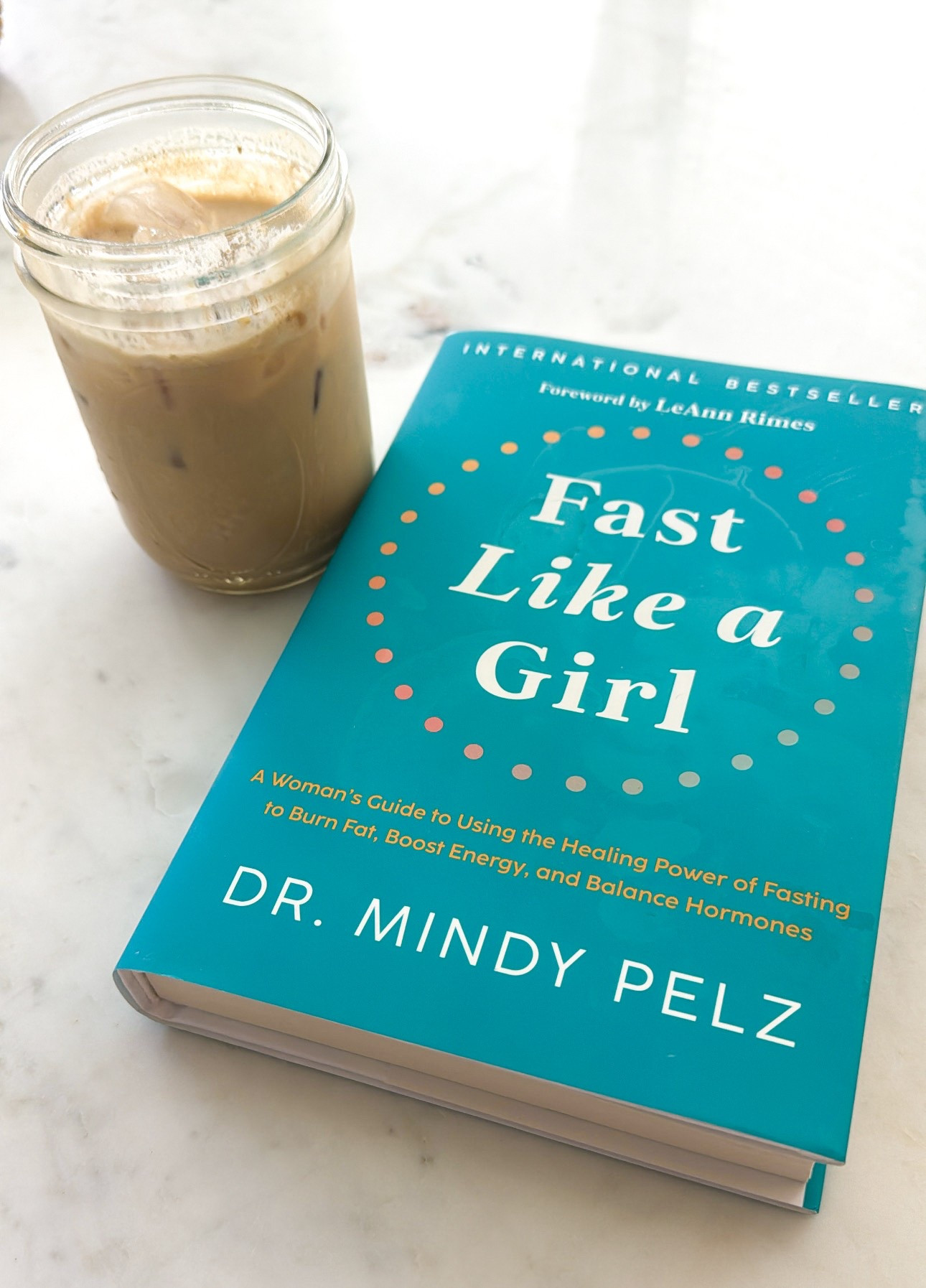 Enjoying my afternoon with a little inspiration and vanilla protein iced coffee in hand. Loving Fast Like a Girl by Dr. Mindy Pelz—it’s a powerful guide on how women can use fasting to support energy, balance hormones, and feel their best. If you’re into wellness reads with science-backed tips, this one’s a must!
Shop my book, protein + mason jar glass below!

#ViCera #WellnessReads #FastingForWomen #LTKWellness #LTKBookClub #LTKHome