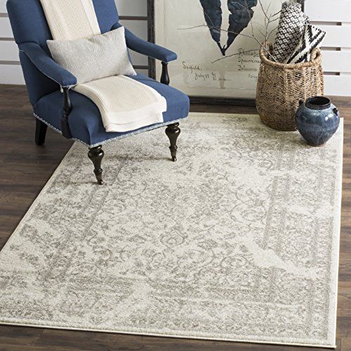 Safavieh Adirondack Collection ADR101B Ivory and Silver Oriental Vintage Distressed Area Rug (9' x 1 | Amazon (US)