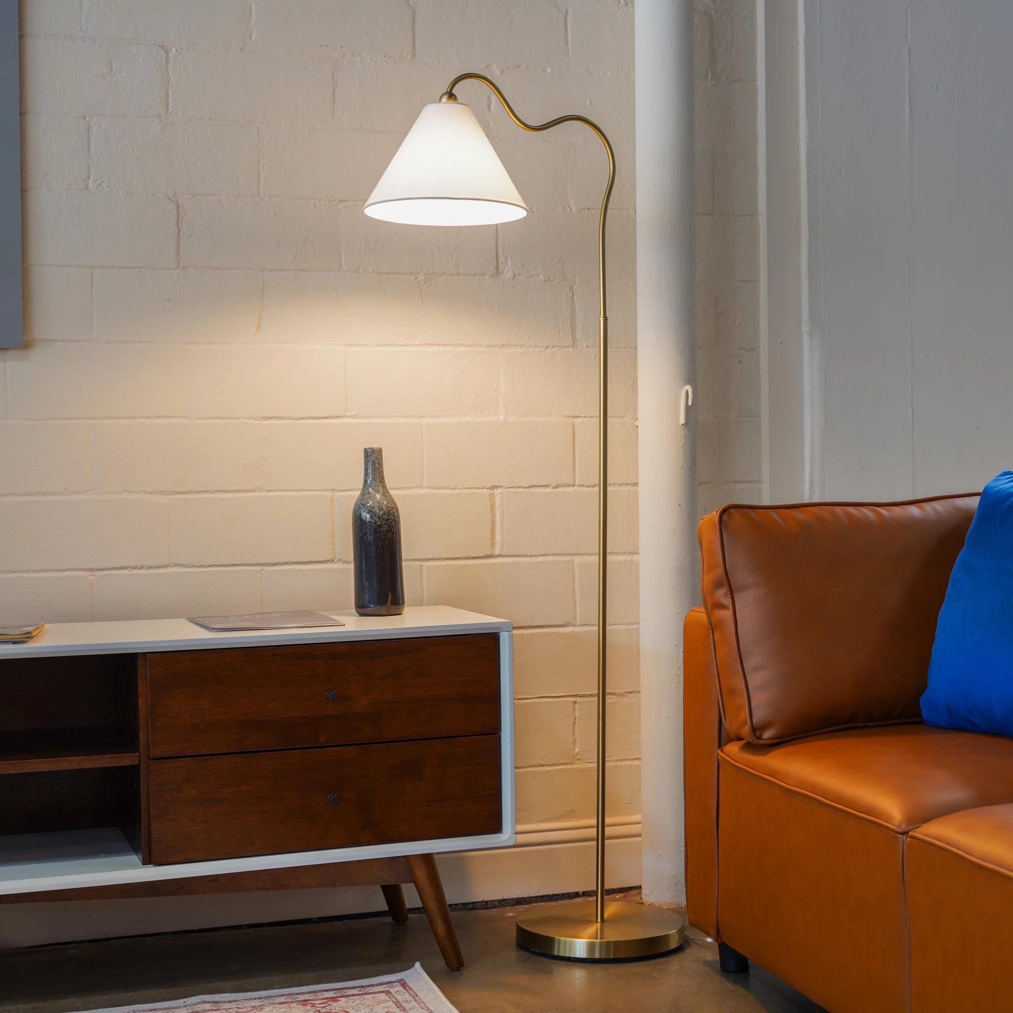 Stina 60" Brass Ring Base Curved Floor Lamp With Triangle White Empire Shade | Wayfair North America