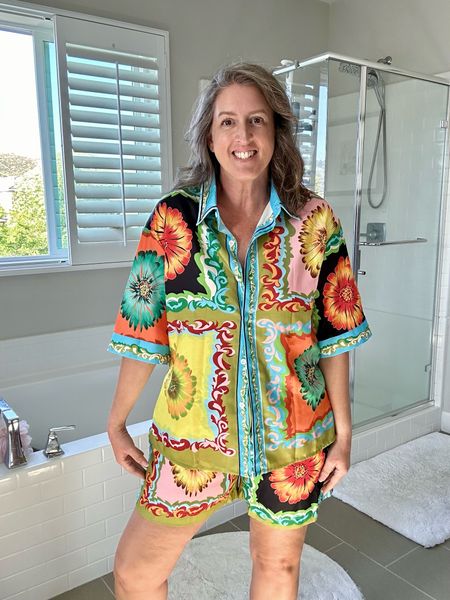 Really love how the green shines through in this pattern, so fun for vacation travels! Lightweight fabric, elastic waistband and pockets! 

Aisongyuan Womens 2 Piece Printed Pajama Set Short Sleeve Button Down Shirt Wide Leg Shorts Summer Loungewear Sleepwear Sets

#LTKStyleTip #LTKTravel #LTKOver40