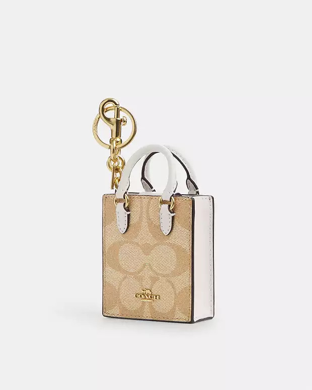 North/South Mini Tote Bag Charm In Signature Canvas | Coach Outlet CA