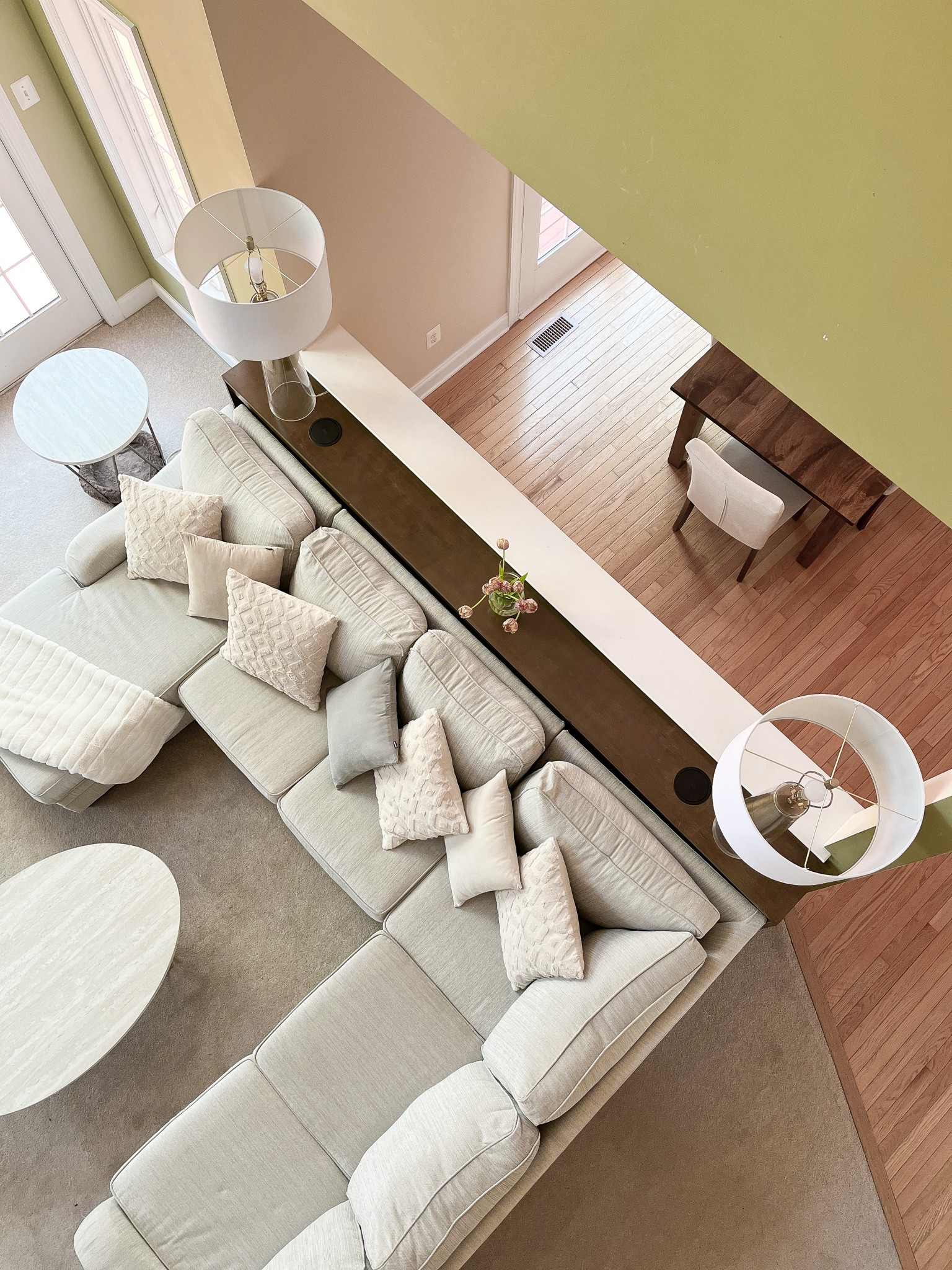 I love looking over the railing and seeing a clean space 😍 (let's be real, it's almost never like this). Still loving this couch, and these lamps are the perfect touch for this room! 

Living room, coffee table, home, white couch, beige couch, console table, lighting, brass lighting, throw pillows, neutral decor



#LTKhome #LTKfindsunder50 #LTKfamily