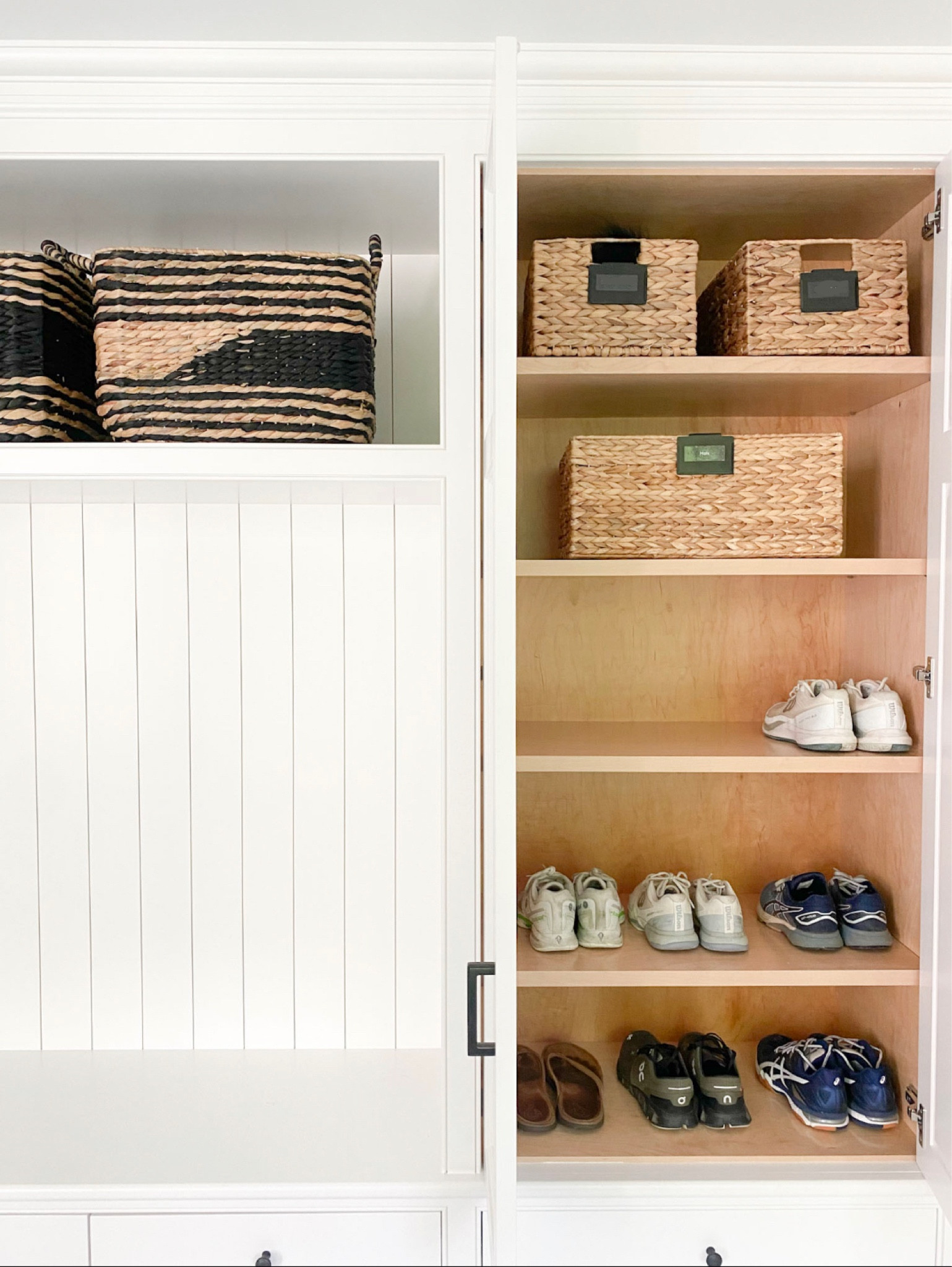 Mudroom on point! 🖤 
Loving the way this mudroom turned out. We added black touches to work with the black hardware and lighting in the space. 

#LTKhome #LTKunder50 #LTKFind