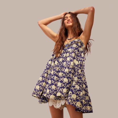 Free People Summer Dress:
Wilder Days Printed Mini Dress. 
P.S. The lace shorts not included with the dress as shown in the picture.