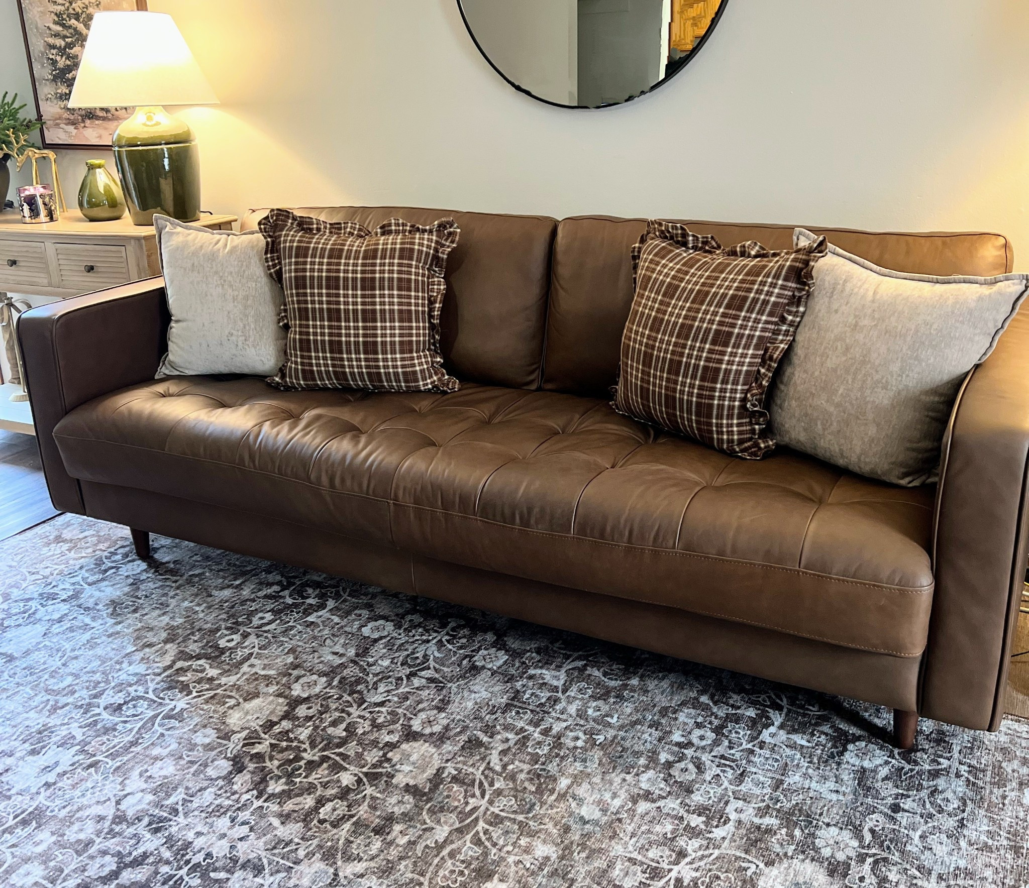 Beautiful sofa, area rug and pillow covers 

#LTKHome