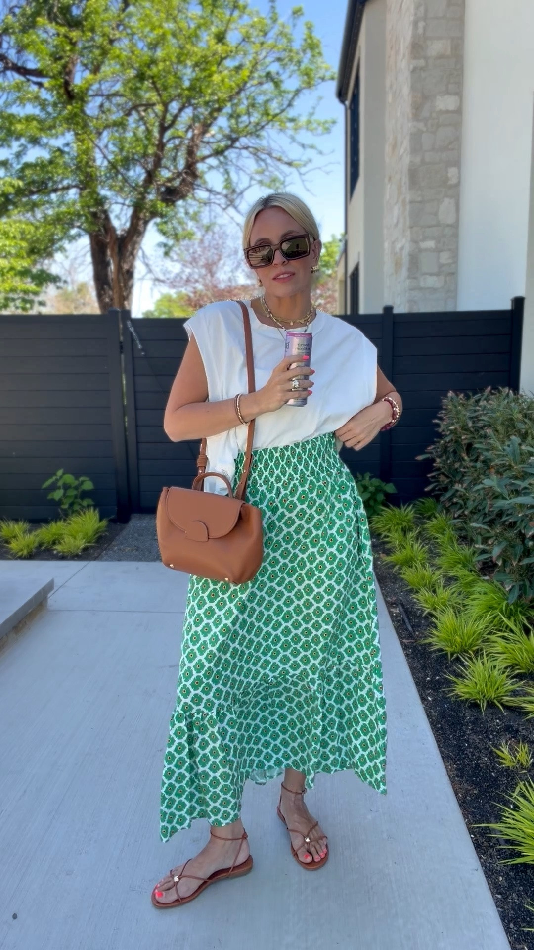 This outfit is so cute! My favorite basic tee from Free People paired with this skirt that can be worn so many ways!

#LTKgrwm #LTKmomlife #LTKootd