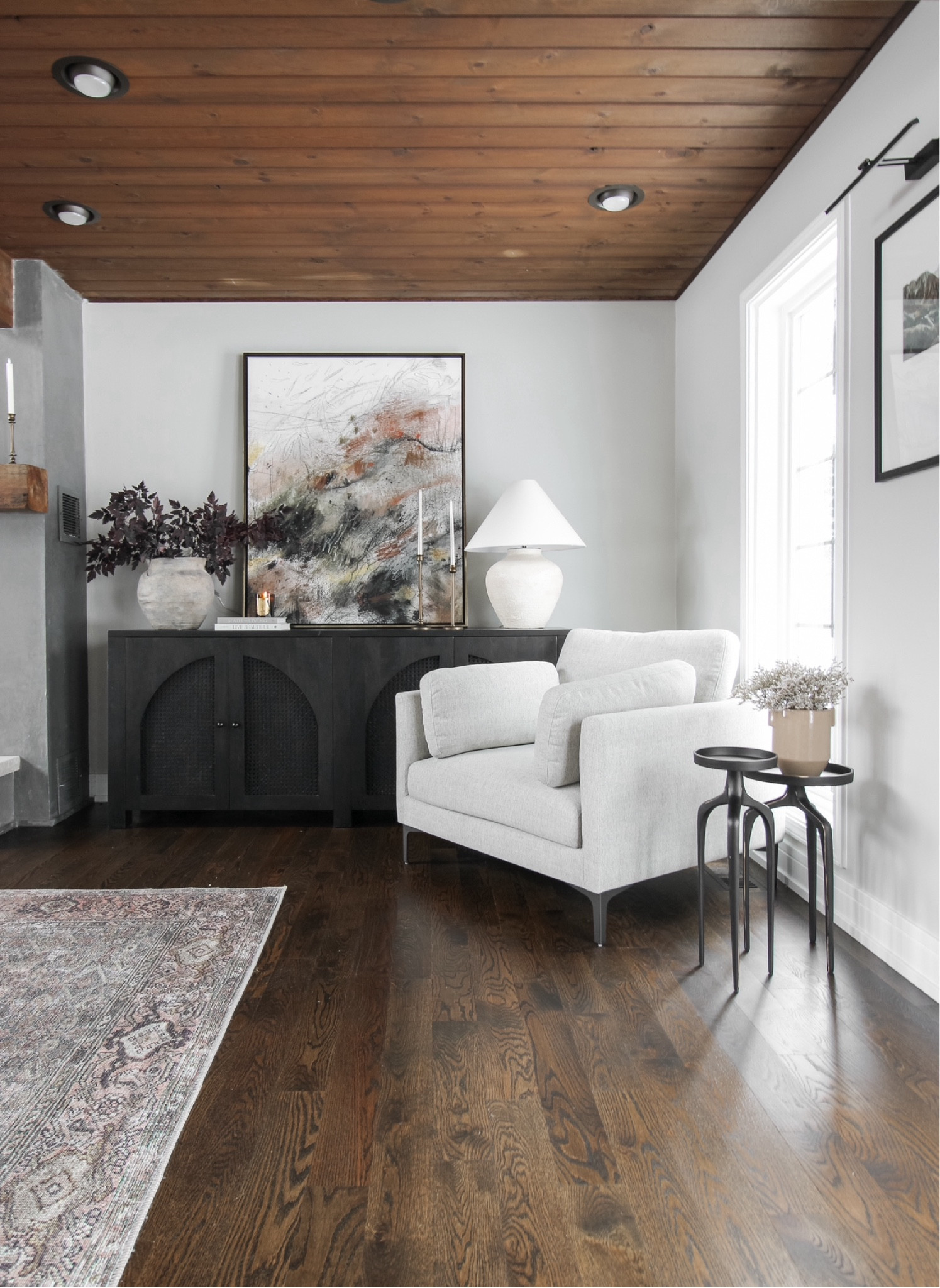 How I styled this larger empty corner in our great room - layering in furniture for storage, decor, and a cozy armchair for reading and relaxing! 

#LTKhome #LTKstyletip #LTKSeasonal