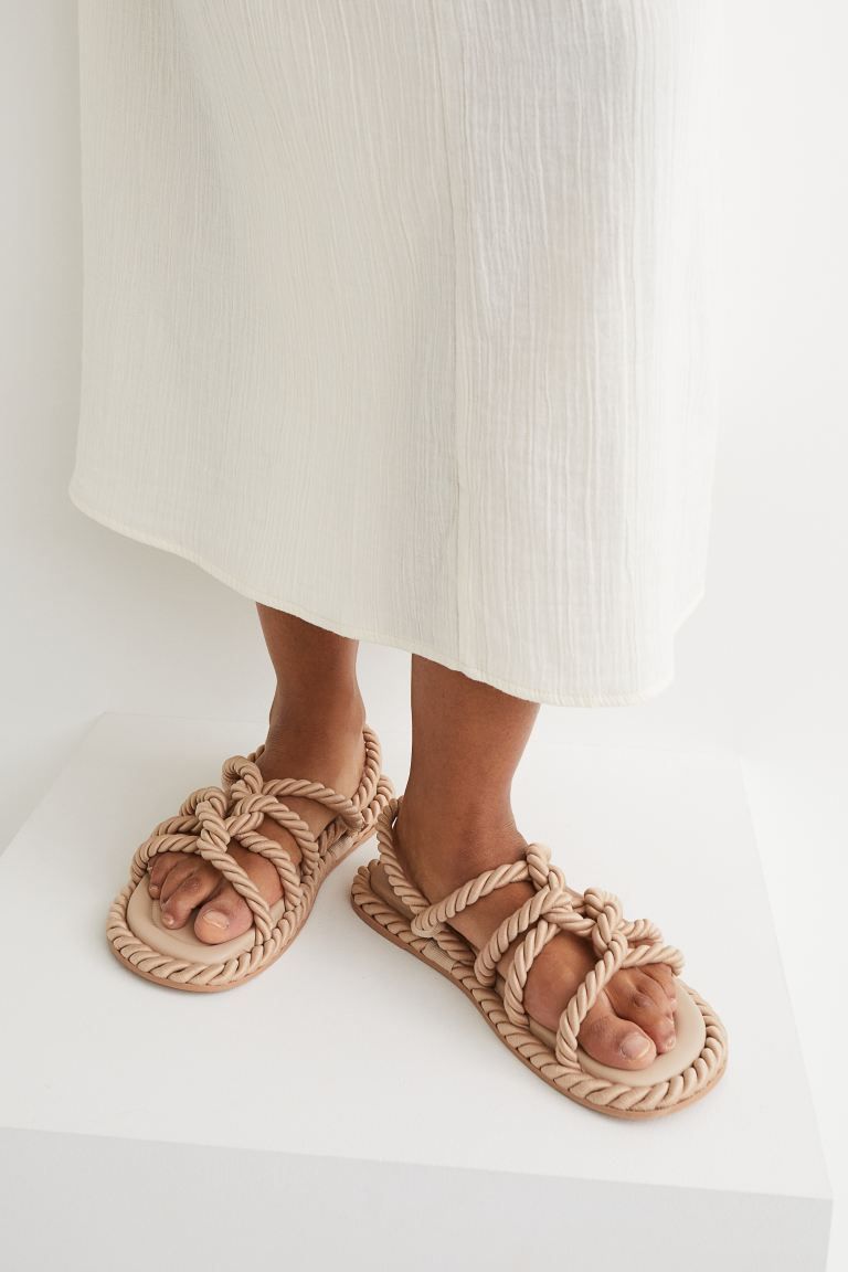 Sandals with twisted, rope-style foot straps. Soft faux leather insoles and fluted soles. Sole th... | H&M (US + CA)