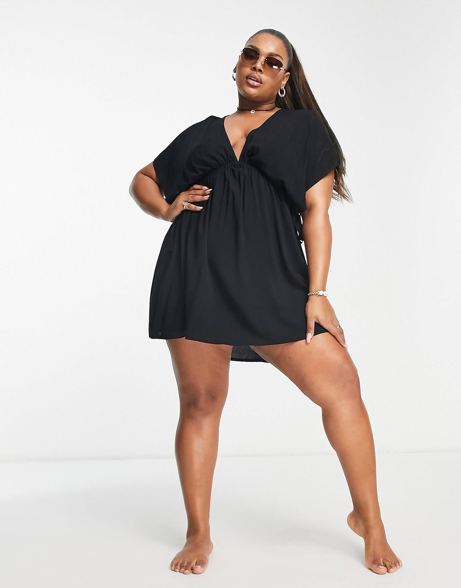 ASOS DESIGN Curve flutter sleeve mini beach dress with channeled tie waist in black | ASOS (Global)