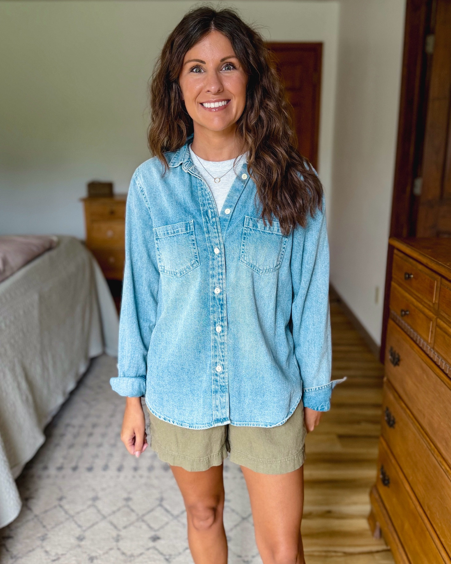 love this denim shirt from @Quince ! I’ve had it for 3 years and it’s a staple in my wardrobe. It’s 100% cotton and I wear size small.

My tee shirt is size small and my linen shorts are xxs. My sandals are size 36.